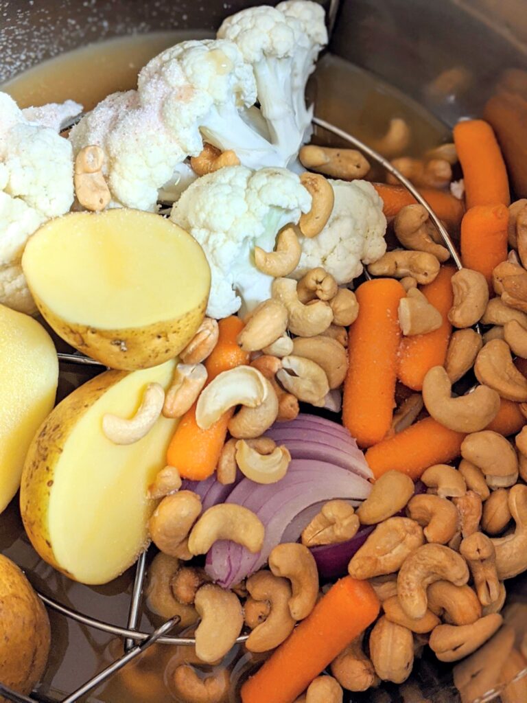 Veggies sitting in an Instant Pot.