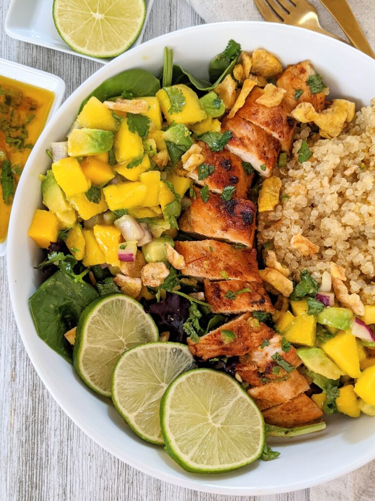 White bowl of the chicken and mango taco dish at a slightly different angle than the other pictures. This one is slightly off center.